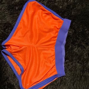 Size medium 8/10 Color orange and purple